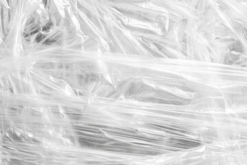 Poster - Crinkled plastic wrap forms an abstract pattern, creating a textured, translucent surface with folds and creases, ideal for backgrounds or design elements