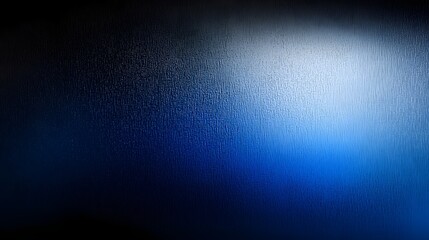 Fototapete - Mesmerizing Digital Gradient with Subtle Noise Texture for Captivating Visuals   A rich blue gradient fading gracefully into a deep black