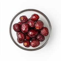 Poster - Red dates in glass bowl, top view.