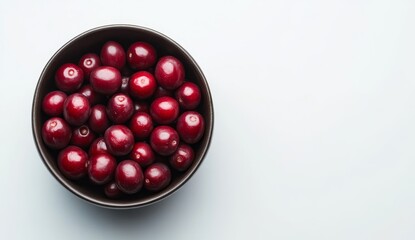 Poster - Bowl of ripe red cherries on white background.