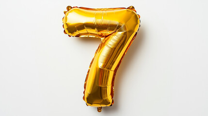 Golden foil balloon number seven. Top view. Colored number on white background.