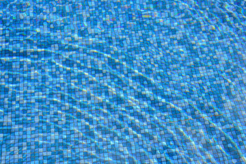 Wall Mural - swimming pool water surface and ripple wave with blue mosaic tiles