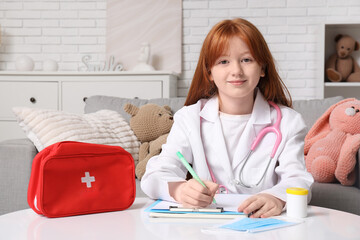 Wall Mural - Teenage doctor with clipboard on table at home