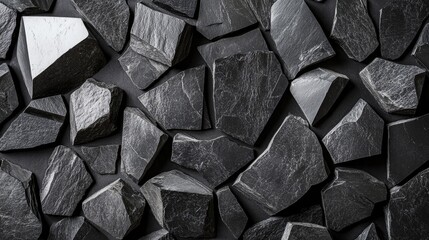 Aufkleber - Abstract arrangement of black stones and rocks in geometric shapes, forming a minimalist pattern that exudes modernity and elegance