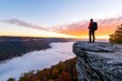 © Panithi - Hiker Admiring Breathtaking Sunrise Over Foggy Mountain Valley