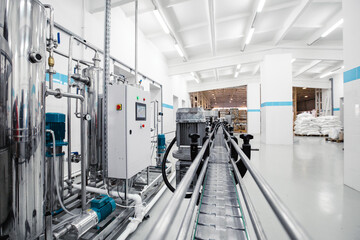 Poster - industrial processing facility featuring automated equipment and a clean production line