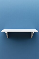 Poster - Minimalist white shelf on blue wall backdrop for product display or interior design concept
