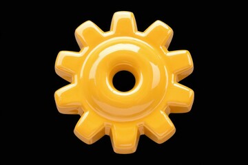 Poster - Glossy Yellow Cogwheel Sunburst Against a Black Background