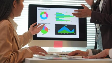 Sticker - Businesswomen team leader showing company financial strategy using charts and graphs on clipboard to colleagues in modern office meeting room.