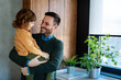 © NDABCREATIVITY - Happy loving daddy and affectionate boy playing, laughing having fun at home. Family leisure concept