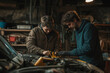 © Татьяна Евдокимова - Father and teenage son working together in a garage, learning car engine repair skills while bonding over hands on maintenance