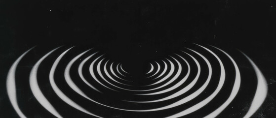 Aufkleber - Concentric film grain patterns creating a dynamic visual effect on a black background
