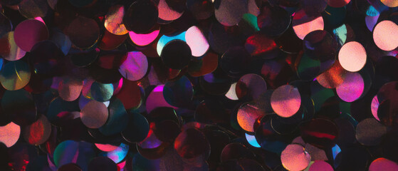 Poster - Vibrant confetti overlay texture in rainbow colors against a dark background