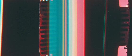 Poster - Nostalgic film texture with color fading and empty middle on dark background for artistic design