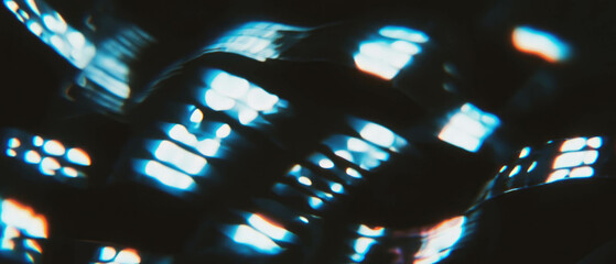 Poster - Artistic overlay texture of film with emulsion lift against black background