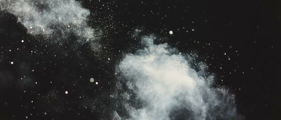 Poster - Fine powdery dust texture with soft light on a black background creating a velvety effect