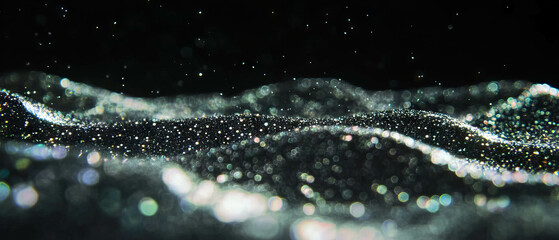 Poster - Elegant glitter texture with blurred particles on dark background for creative projects