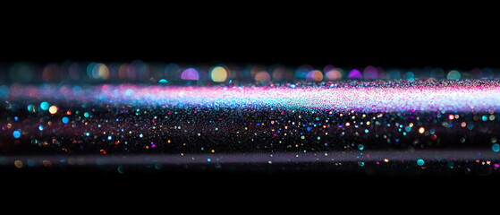 Poster - Vibrant glitter texture with iridescent particles reflecting light on a black background