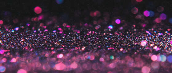 Poster - Glittering particles create a festive atmosphere against a dark background