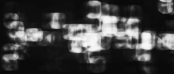 Poster - Stunning light bokeh texture with square shapes on dark background for creative visuals