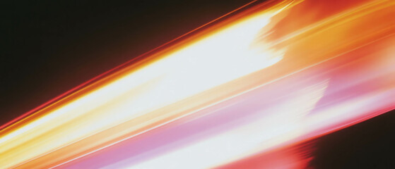 Poster - Warm light texture with golden hues creating a cozy atmosphere against a black background