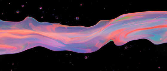Poster - Liquid bubbles create abstract patterns on a black background