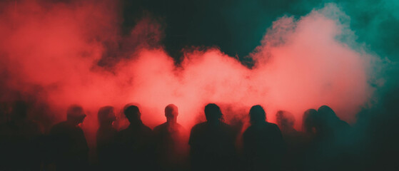 Poster - Mysterious silhouettes of performers emerge from colorful smoke on stage at night
