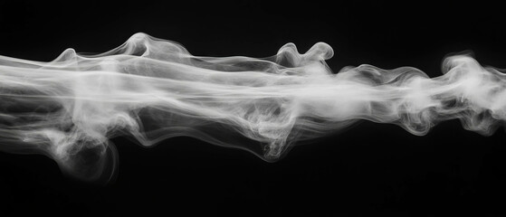 Poster - Chilling atmosphere created by low-lying fog with dry ice effect against a black background