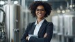 © Narongdet - Professional woman in business attire modern brewery portrait industrial setting confident smile empowerment