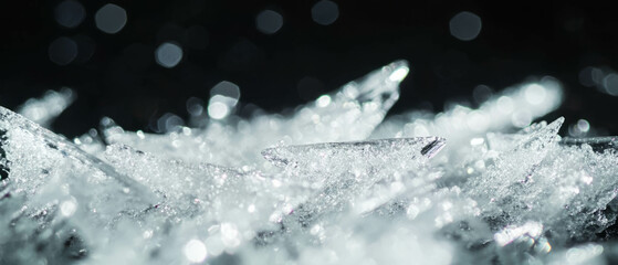 Poster - Sparkling snow overlay with ice crystals on a dark background showcasing a frozen texture