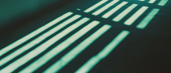 Aufkleber - Shadows of window frames create striking geometric patterns on a dark surface