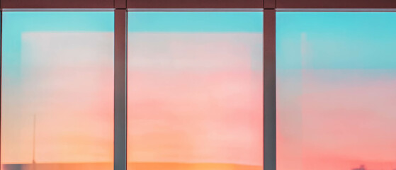 Poster - Window light at sunrise creates warm colors and a golden glow against the dark background