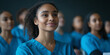 © Oleksandr - Group of nursing students in blue scrubs taking notes during a class, focusing on their studies and learning