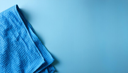 Aufkleber - Blue fabric texture on a blue background. Concept of minimalism, simplicity, and cleanliness.