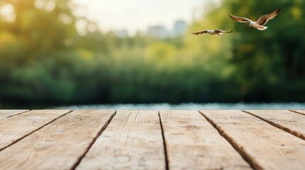 Poster - Empty wooden table near stream, background of birds in flight and natural light