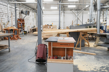 Furniture factory workshop with wood items.