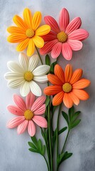 Poster - Colorful Flowers Arrangement on Textured Background with Orange Pink White and Yellow Petals