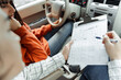 © Maria Vitkovska - Driving instructor explaining parking maneuver to student during exam