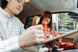 © Maria Vitkovska - Driving instructor explaining mistake to young student during driving lesson