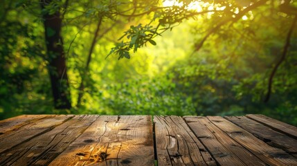 Wall Mural - Empty wooden table with green tree background