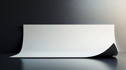 Aufkleber - Blank white sheet of paper curled up from a reflective surface with black background