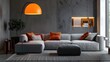 © Lasvu - Orange lamp over gray sofa in contemporary interior