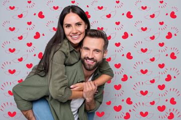Poster - Portrait of attractive cheerful couple friends hugging having fun piggy backing weekend isolated over grey pastel color background