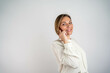 © Nenad - portrait of mature smiling woman with mobile phone looking left