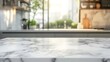 © Teti - Close-up of white marble countertop set against a blurred modern kitchen background.