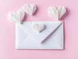 © bvbflo1 - Love letter envelope with paper craft hearts on soft pink background