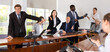 © JackF - Group of business people arguing in meeting room, shouting at each other.