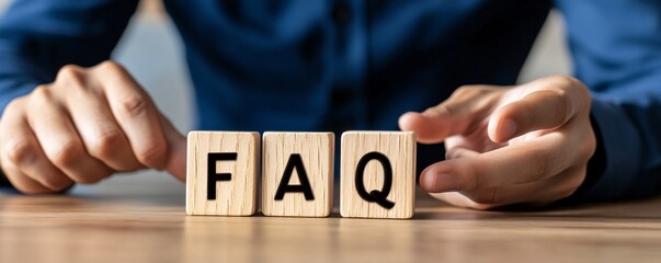 Poster - Businessman is showing faq concept on wooden cubes