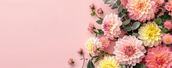 Poster - Beautiful floral composition with pink and yellow dahlia flowers on pastel pink table, top view, flat lay
