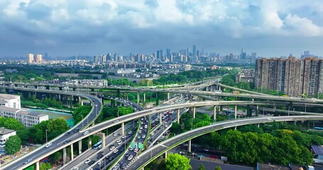 Wall Mural - Aerial shot of cityscape with highway overpass and modern skyline in Nanjing, China